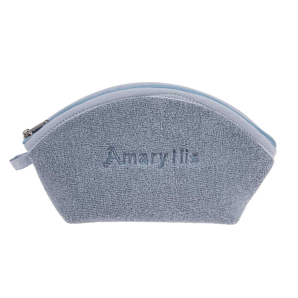 Çantë praktike prej materiali peshqiri në ngjyrë blu të çelët, me zinxhir