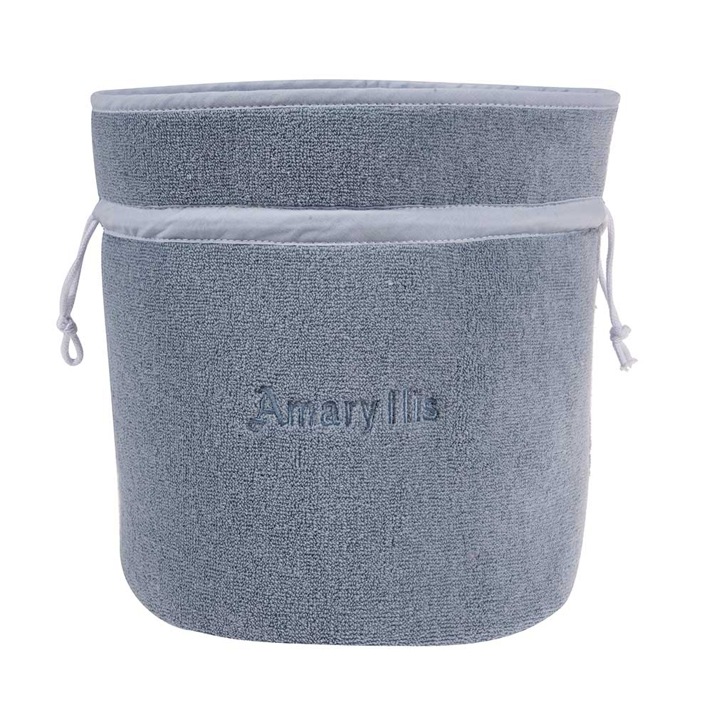 Çantë e madhe lloj “pouch” prej materiali peshqiri, në ngjyrë blu të çelët.