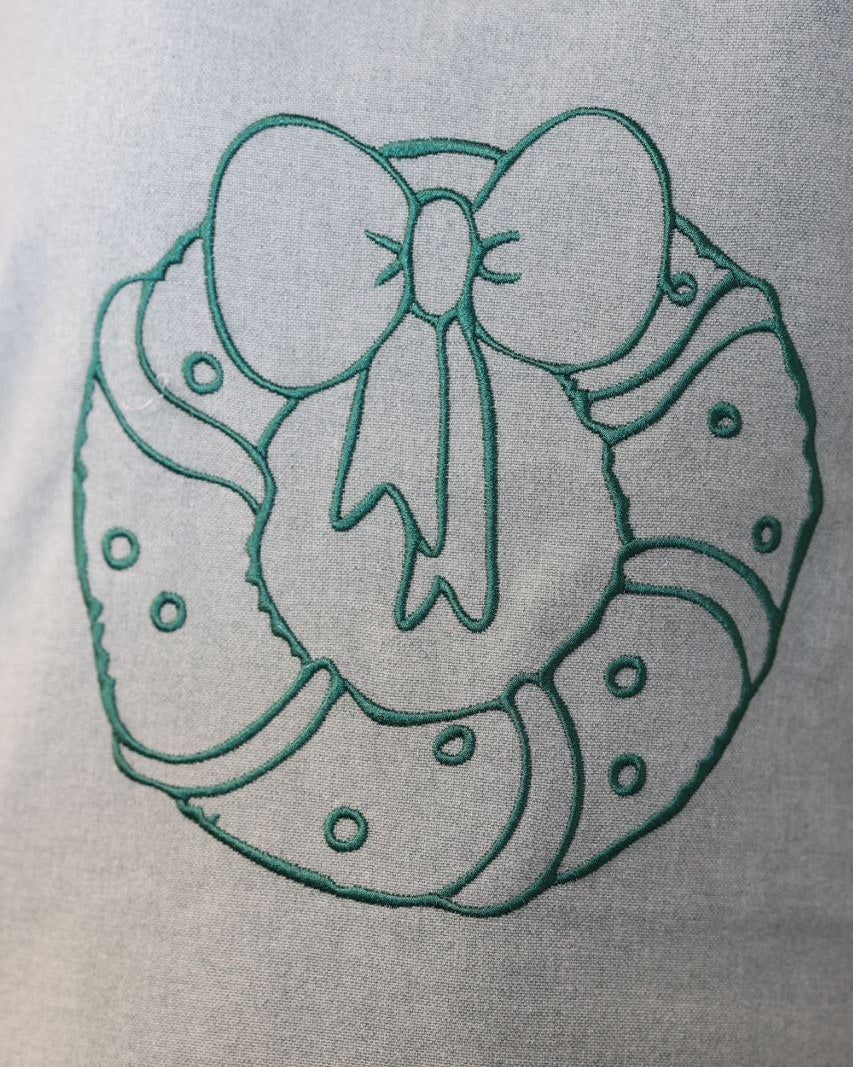 Përparëse kuzhine me qëndisje festive